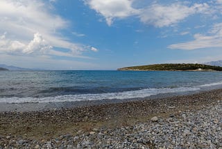 A rocky beach overlooking the ocean, JA Vassili, Medium