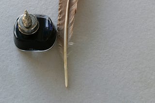 Quill and inkpot