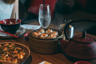 A table laid with Chinese food