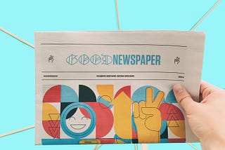 A random newspaper with the title “Good Newspaper” on the front, with lots of colorful graphics underneath, and a light blue background behind the newspaper.