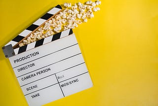 movie production tool, with popcorn, yellow background!