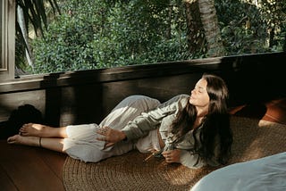 Woman lying down, relaxing doing nothing at all