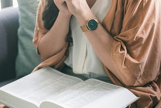 Woman praying and talking to God.