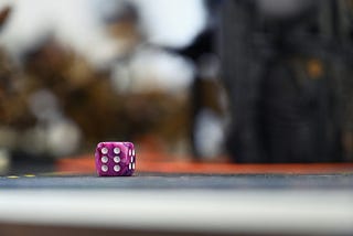 A Die Game Puzzle by the Numbers