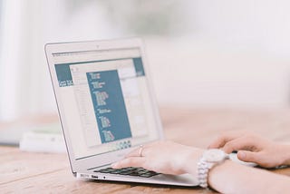 A person working online using a laptop