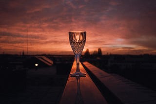 goblet with a red sunset background