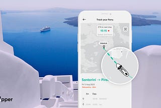 The ferry tracking feature of the Ferryhopper App and white Cycladic houses in Santorini in the background