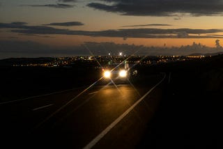 Driving on a Road Lit By Bombs