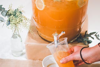 Image of juice in a clear plastic cup