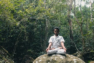 Lotus position or Padmasana is a cross-legged sitting meditation pose from ancient India, in which each foot is placed on the opposite thigh. It is an ancient asana in yoga, predating hatha yoga, and is widely used for meditation in Hindu, Tantra, Jain, and Buddhist traditions.