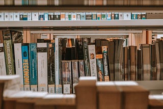 Books on an academic library shelf.