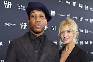 Jonathan Majors and Grace Jabbari attend the “Devotion” Premiere at Cinesphere on September 12, 2022 in Toronto, Ontario.