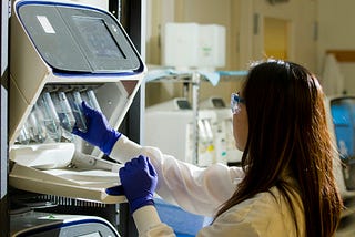 DNA Genotyping and Sequencing. Technician prepares for a viral whole-genome sequencing experiment at the Cancer Genomics Research Laboratory, part of the National Cancer Institute's Division of Cancer Epidemiology and Genetics (DCEG).