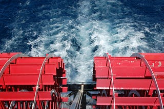 Steamboat paddles in the water