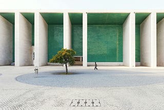 Photo of a courtyard in front of a building with pillars, by José Duarte on Unsplash