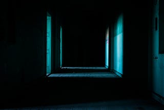 A dark dimly lit hallway