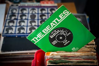 Beatles album and 45 record with green cover