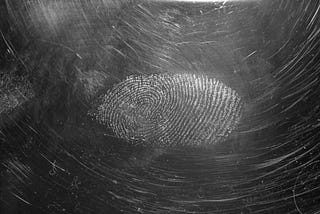 Fingerprint on an aged surface.