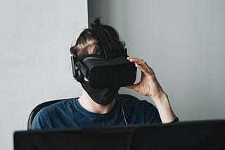 Man wearing a mask and a VR headset