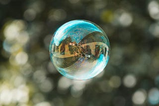 a bubble reflecting everything around it.