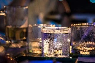 glasses of alcohol, beer, and wine with condensation on then=m.