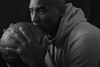 NBA player Black Mamba, Kobe Bryant with basketball.