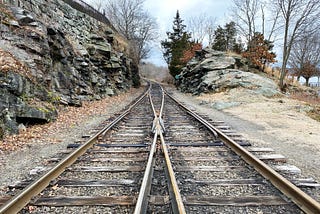 Two train tracks converging