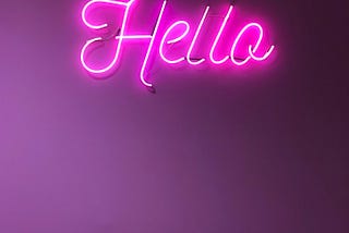 In the background the word “Hello”.