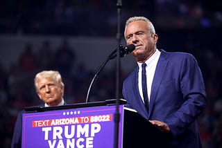 Donald Trump and Robert F. Kennedy, Jr. speaking with attendees at an Arizona for Trump rally at Desert Diamond Arena in Glendale, Arizona, 2024