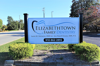 Dr. Justin DeGarmo of Elizabethtown Dentistry Shares The Pros And Cons Of Dental Implants Vs.