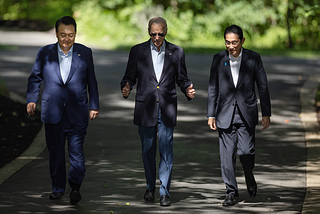 China Casts Shadow on Historic Trilateral Summit