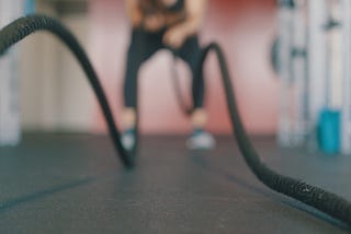 a person trains in the gym