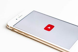 Phone showing the YouTube logo on the app