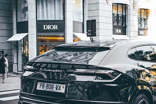 Dior shop and Lamborghini Urus