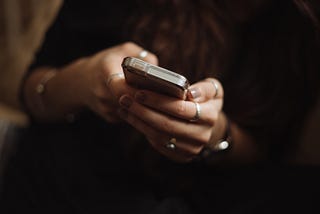 holding phone in hand; I’m using it as an example of learning using phone.