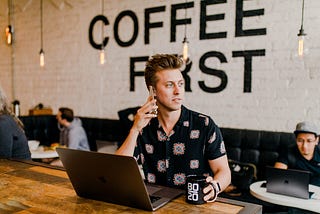 developer coding on his laptop