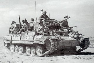 Valentine tank in the western desert carrying troops