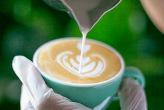 Closeup of a caffe latte being made.