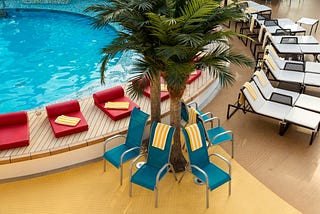 Deck chairs around a pool
