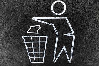 a white line drawing of a person throwing a trash can