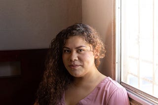 Portrait of Latina woman representing patients that benefit from genetic testing for hereditary cancer risks — Invitae blog