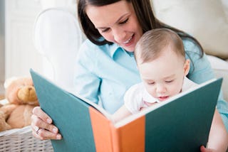 baby reading a book