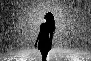 Silhouette Of Woman Under Rain. #AmWriting #ShortStory