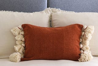 cotton-chenille-lumbar-pillow-with-tassels-rust-1
