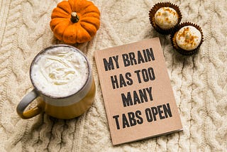 notebook that says “my brain has too many tabs open”