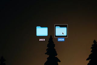 User clicking on a folder titled ‘2024’ next to one titled ‘2023’