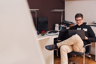 writer, writing, freelance writing, office worker, happy man, guy on laptop