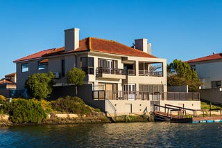 A gorgeous house on a lake.