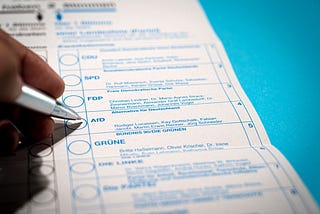 a voter filling out their ballot in an American election