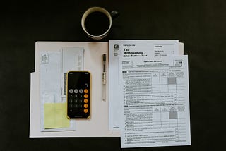Calculator opened in phone and Tax related documents